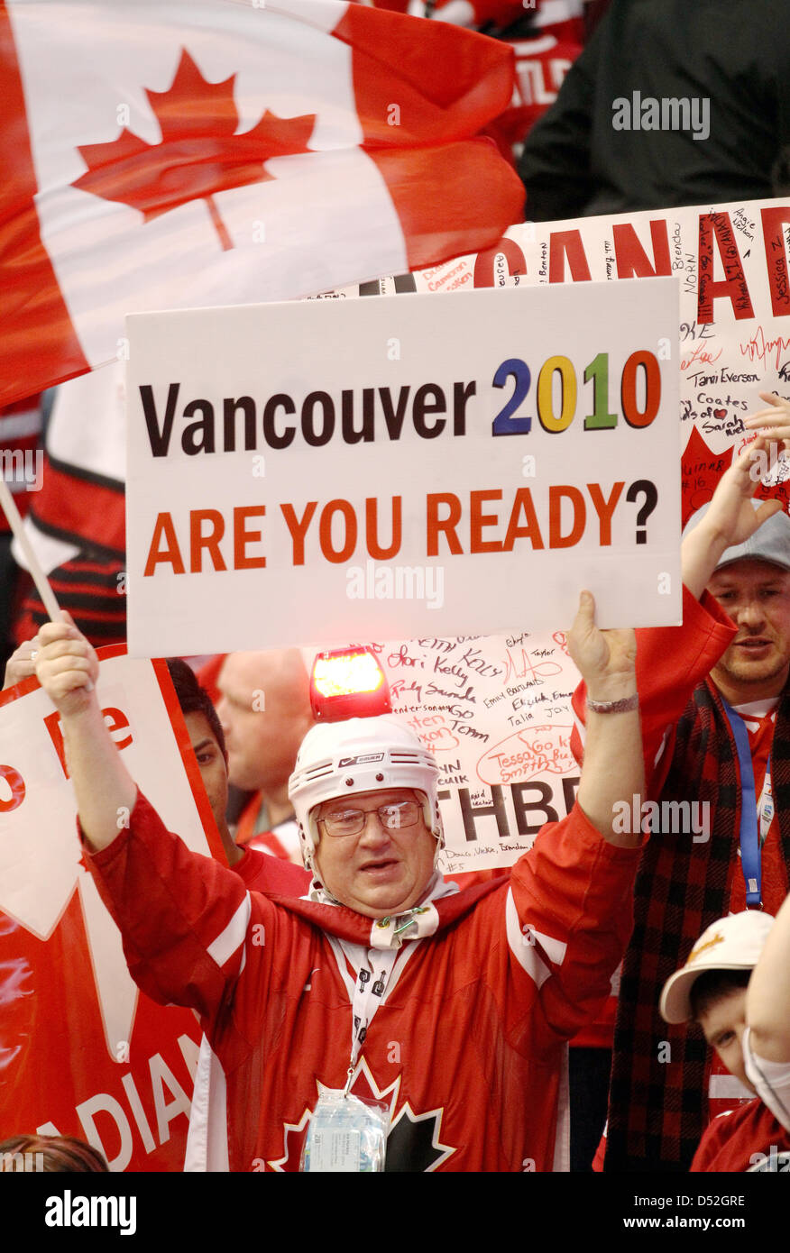 A canadian supporter holding a sign reading `Vancouver 2010 are you ready?` during the Ice Hockey gold medal game 30 in Canada Hockey Place, in Vancouver, Canada, 28 February 2010. Photo: Daniel Karmann  +++(c) dpa - Bildfunk+++ Stock Photo